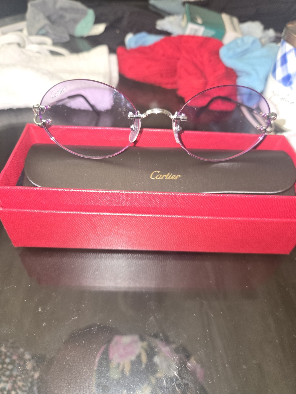 Cartier Women’s Rimless Oval Sunglasses - Purple Lenses, Silver Bridge